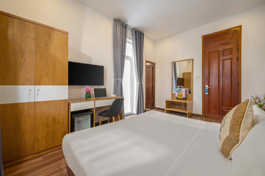 Een TV en/of entertainmentcenter bij Myrtle Boutique Hotel

