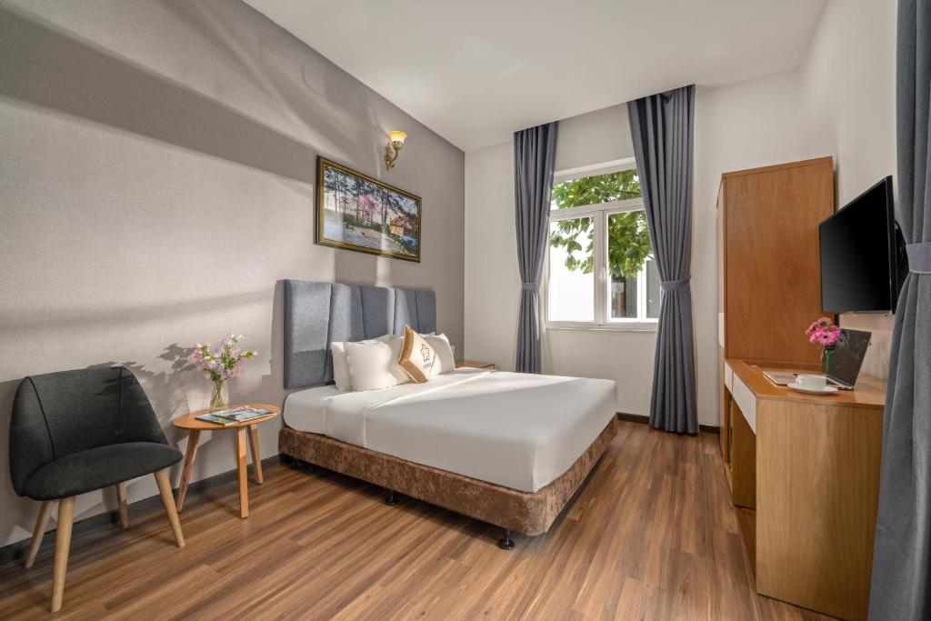 Een bed of bedden in een kamer bij Myrtle Boutique Hotel