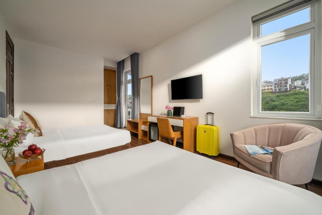Een bed of bedden in een kamer bij Myrtle Boutique Hotel