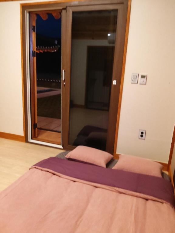 Postel nebo postele na pokoji v ubytování Wonhwaroo