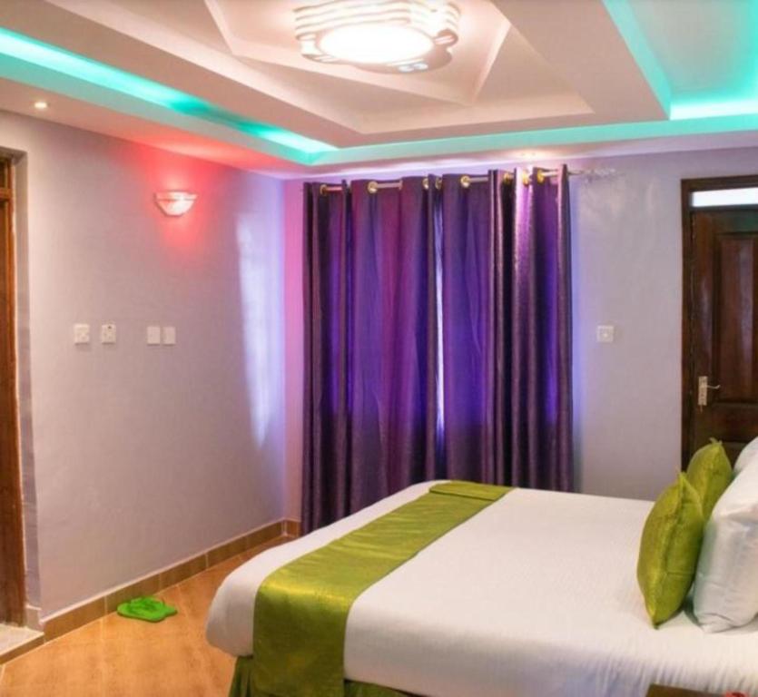 Postel nebo postele na pokoji v ubytování Luna hotel
