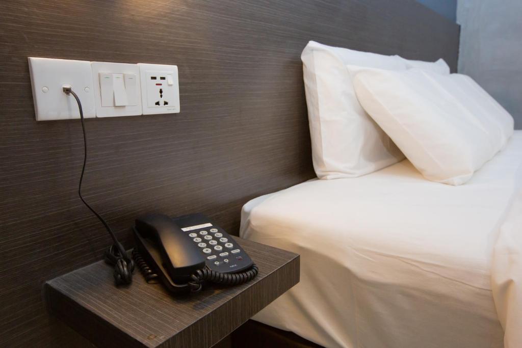 Letto o letti in una camera di 1 Hotel Signature