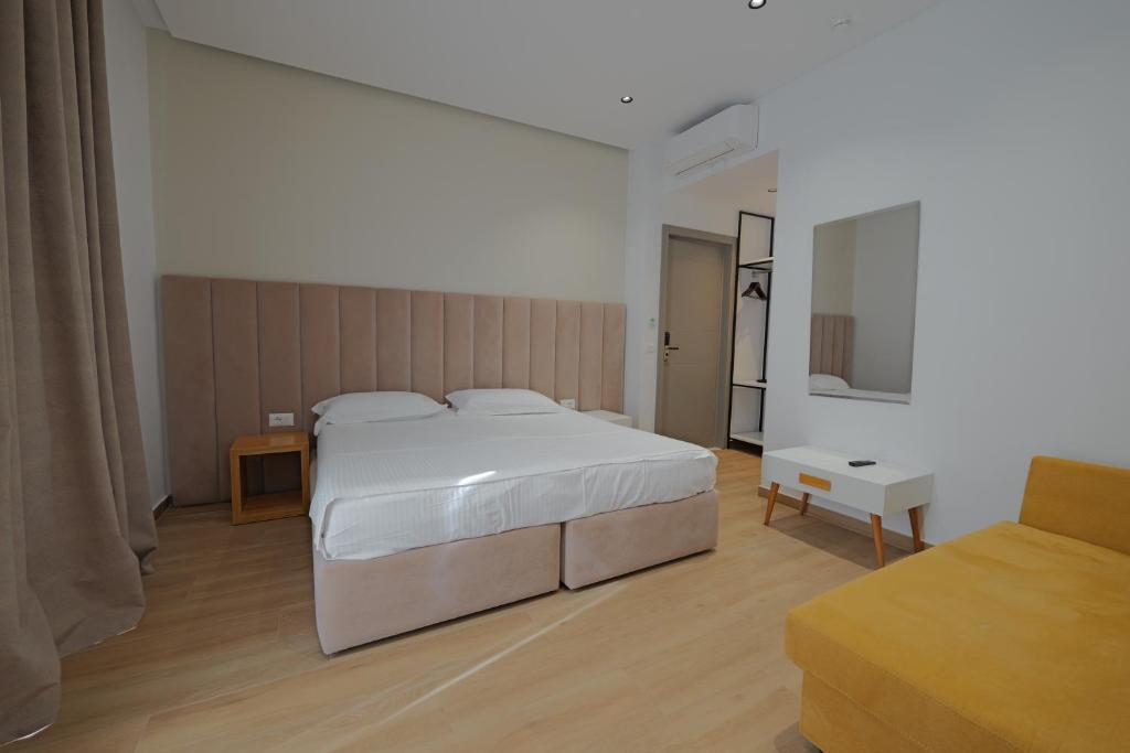 Postel nebo postele na pokoji v ubytování Sea & Sand Hotel