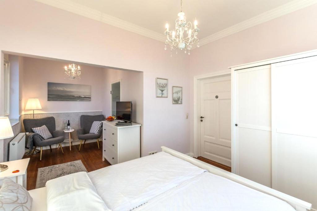 Postel nebo postele na pokoji v ubytování Hotel Villa Wahnfried Thiessow