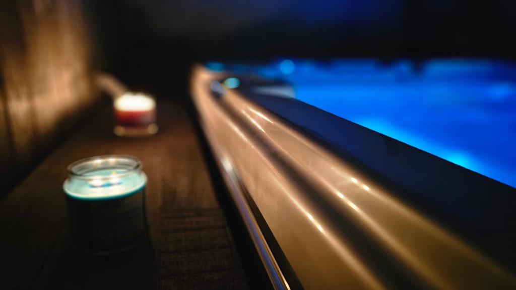 a blurry picture of a bench with a candle at Spa dans les Alpes in Desingy