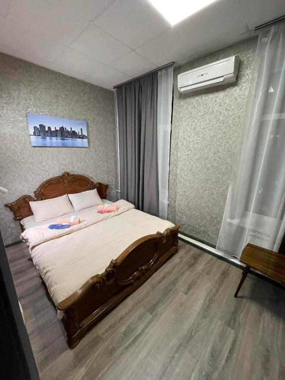 Postel nebo postele na pokoji v ubytování STAR CITY Hostel