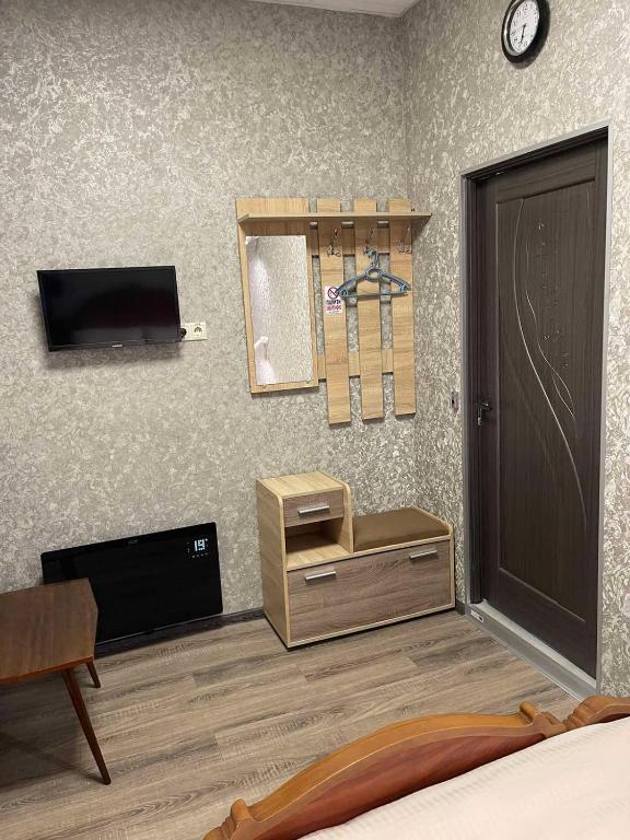 TV a/nebo společenská místnost v ubytování STAR CITY Hostel