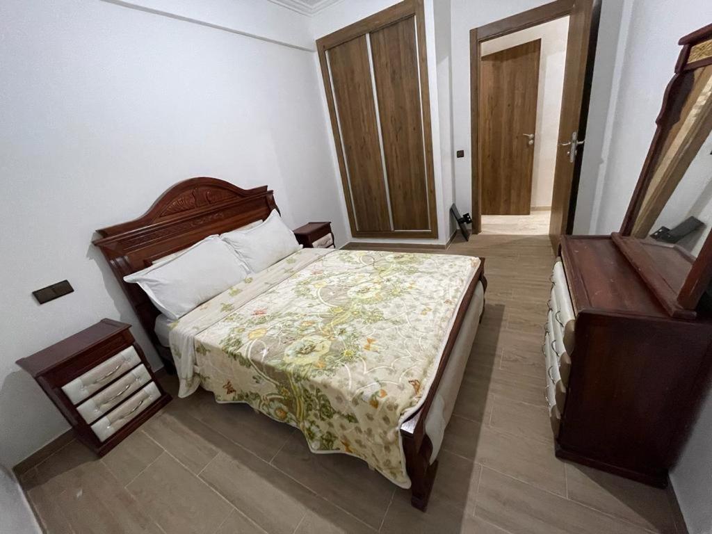 Llit o llits en una habitació de Appartement centre Marrakech