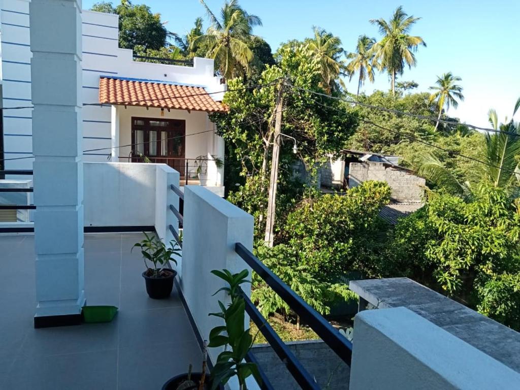 a view from the balcony of a house at Dream Villa in Matara