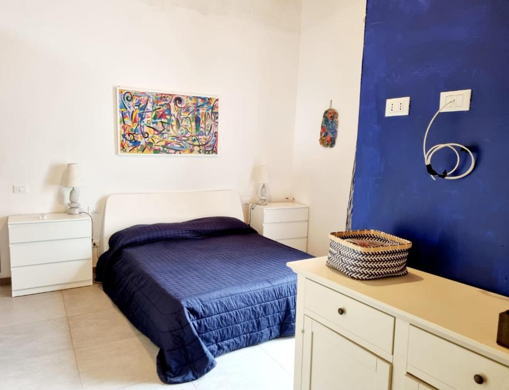 Łóżko lub łóżka w pokoju w obiekcie Casa vacanza in lipari ,PIANO PIANO