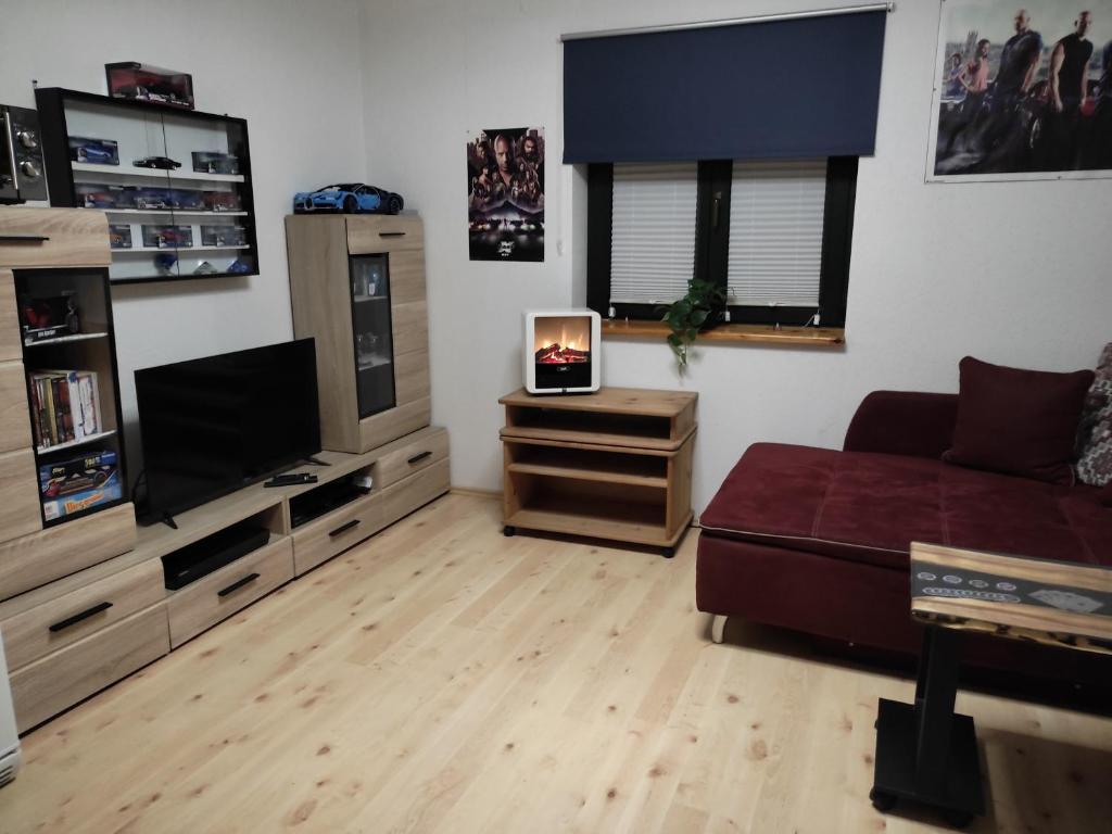 Et tv og/eller underholdning på Ferienwohnung Nähe Lüneburg und Bad Bevensen