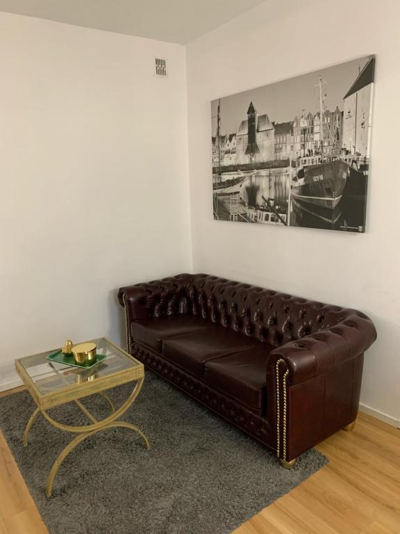 Posedenie v ubytovaní Gold Box Apartament