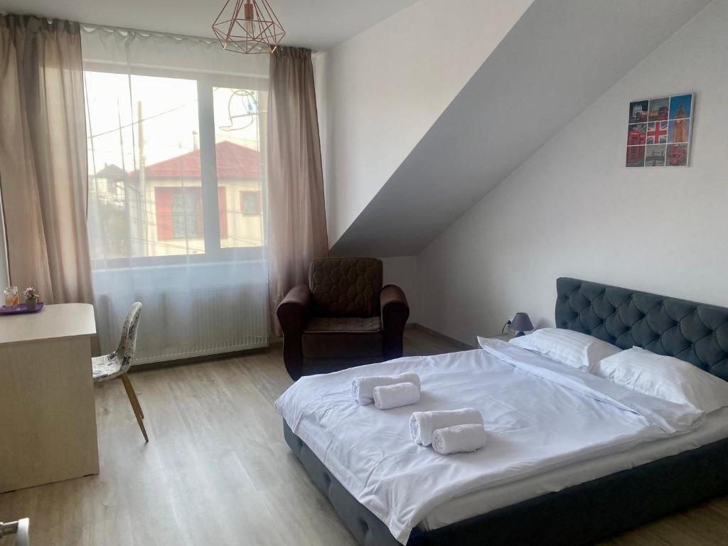 Postel nebo postele na pokoji v ubytování InnTime
