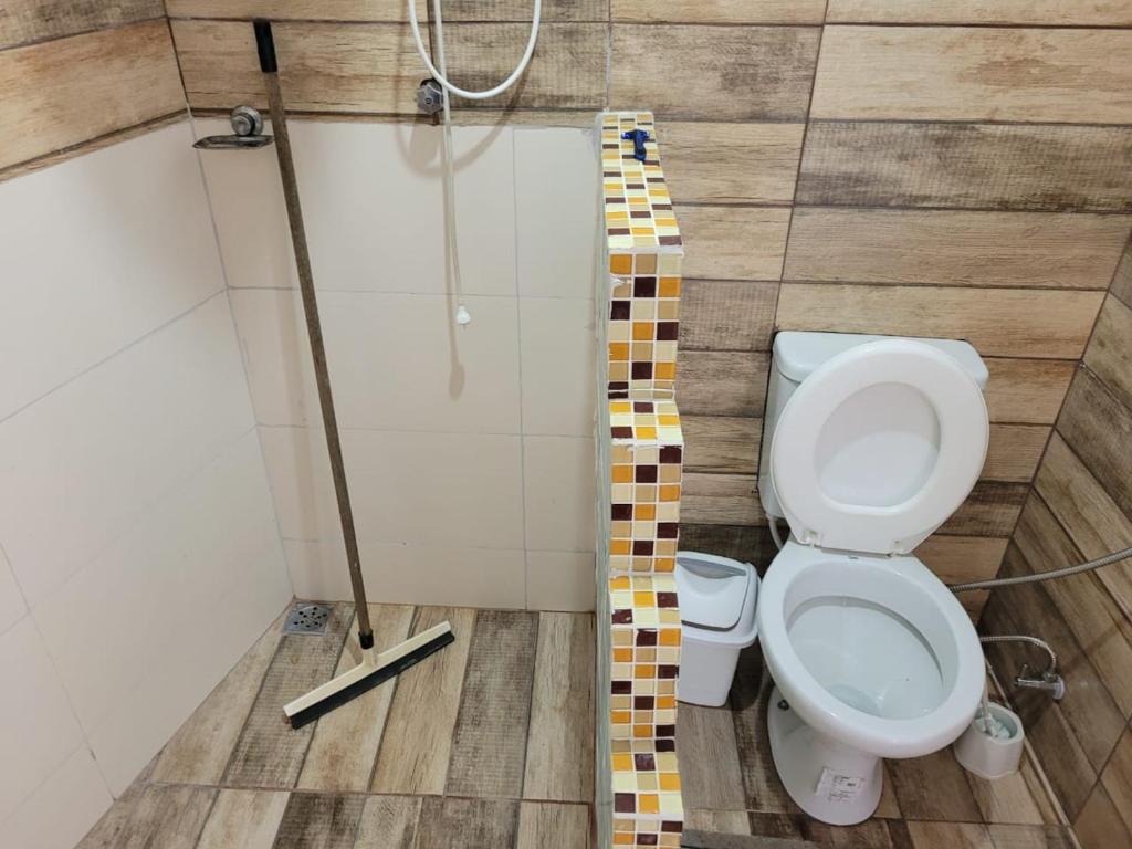Koupelna v ubytování Casa de Temporada Piumhi