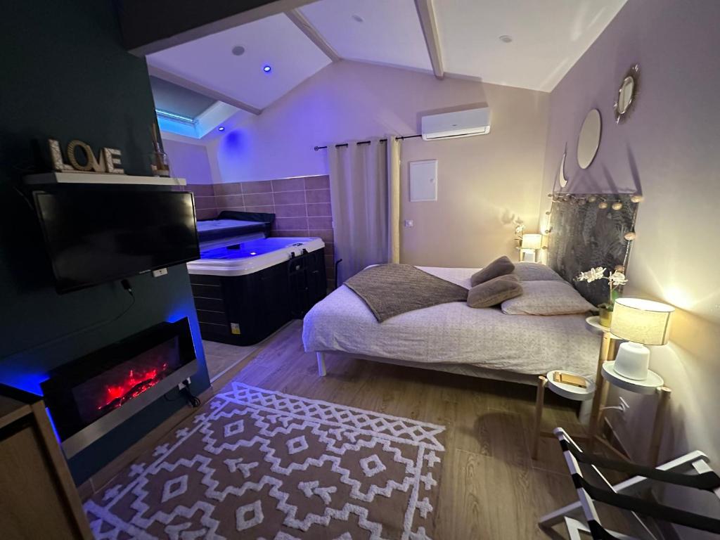 En eller flere senge i et værelse på Laloveroom