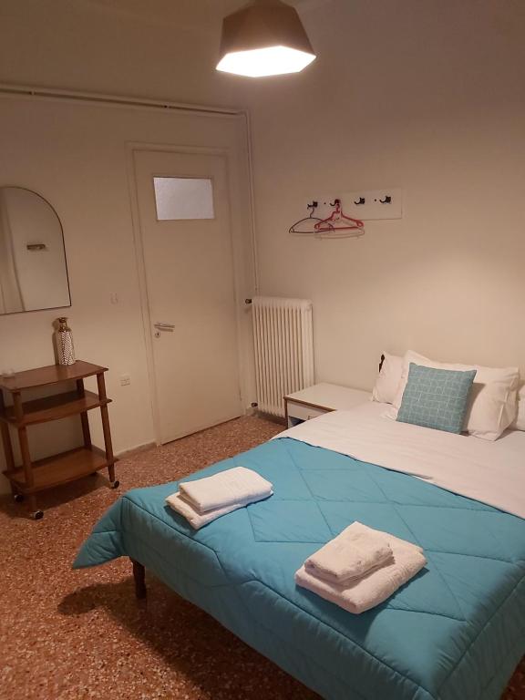 Postel nebo postele na pokoji v ubytování Ermis Hotel