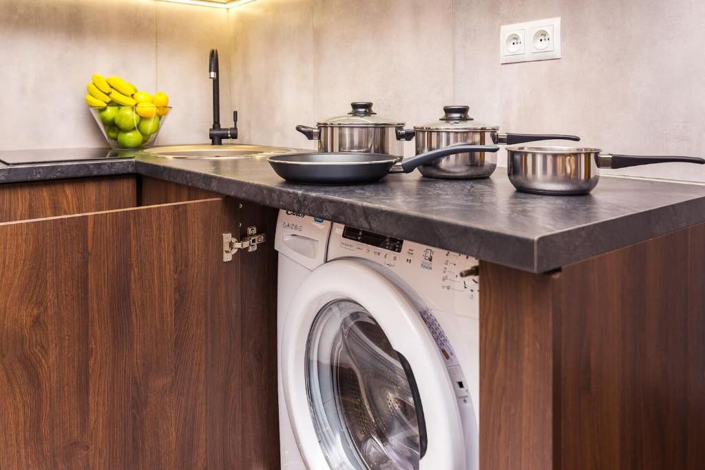 Kuchyňa alebo kuchynka v ubytovaní Bruna 2 - Charming Apartment by Noclegi Renters