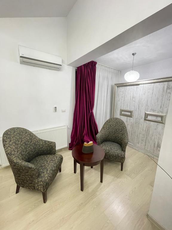 Un lugar para sentarse en Vila Zoe BucharestAirport&Therme&Parking Otopeni