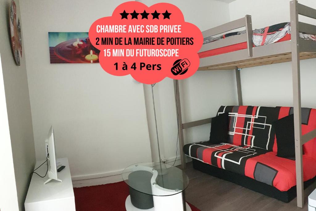a sign in a room with a bunk bed and a chair at Chambres Poitiers Centre Ville - Salle de Bain, Réfrigérateur, TV et machine à café privatifs - Cuisine commune - Terrasse - Hôtel de ville à 200m in Poitiers
