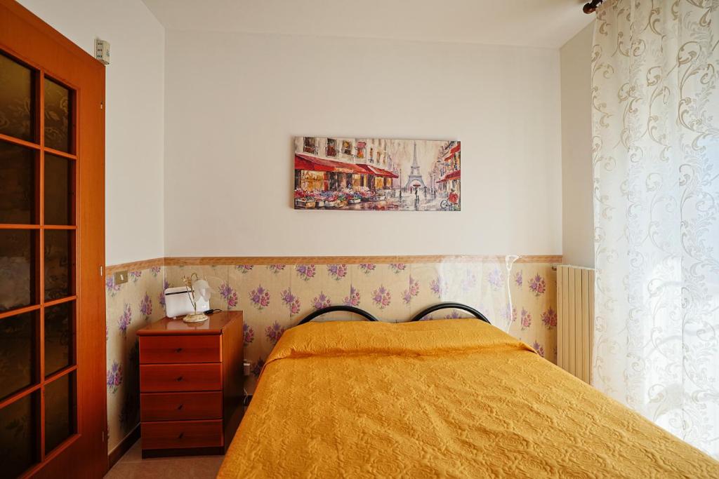 Postel nebo postele na pokoji v ubytování Le Rose di Lena