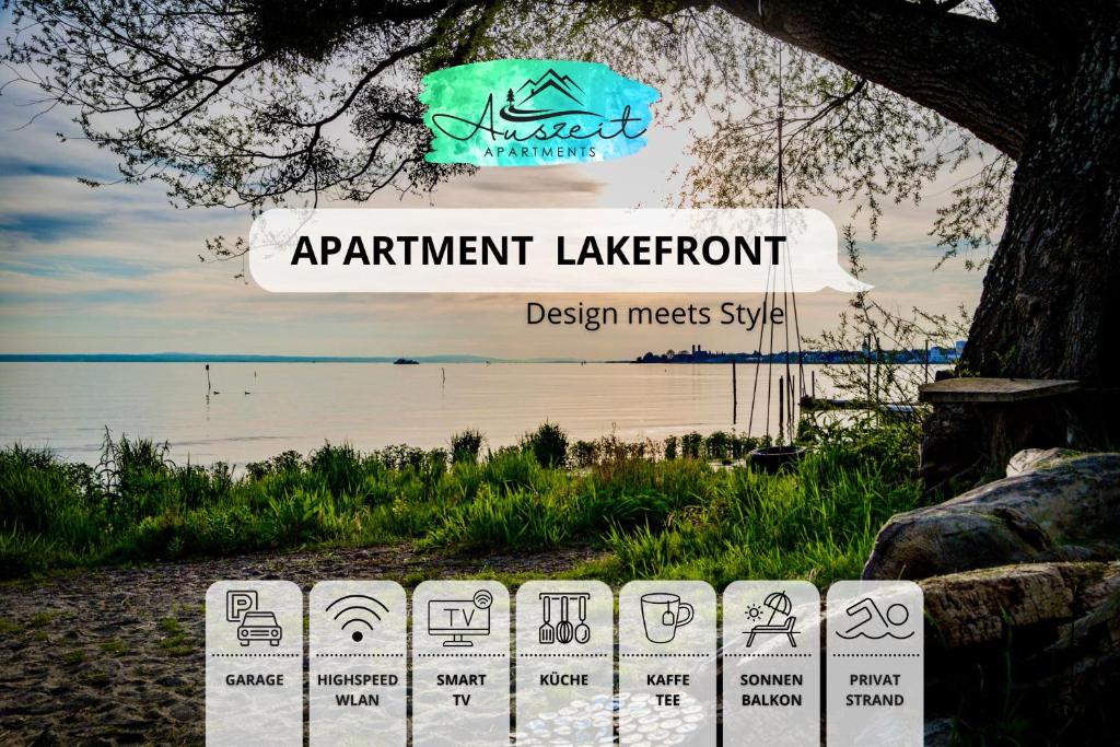 a sign for a parkinant lakefront with a beach in the background at Auszeit Apartment LAKEFRONT in Friedrichshafen