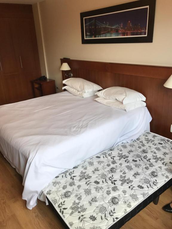Postel nebo postele na pokoji v ubytování Flat em Gramado