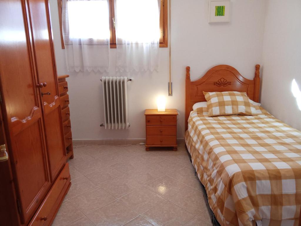 Postel nebo postele na pokoji v ubytování Best Biescas Tourist Home