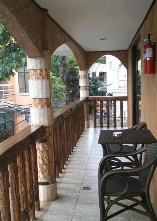 Balkón nebo terasa v ubytování Double Diamond Inn Guest House