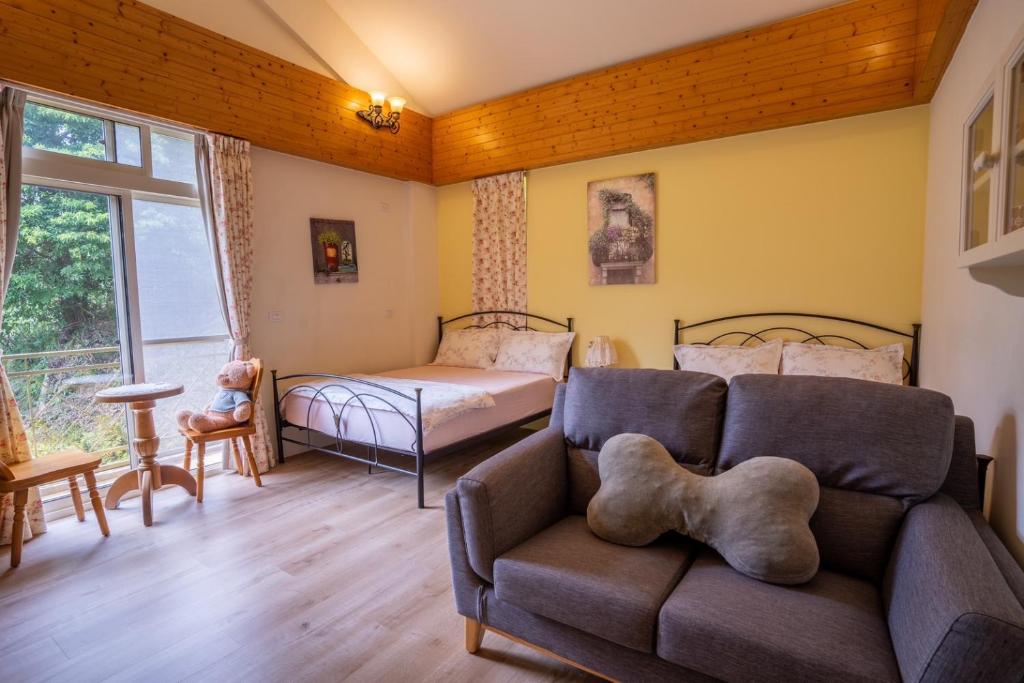 Postel nebo postele na pokoji v ubytování 普羅旺斯鄉村民宿