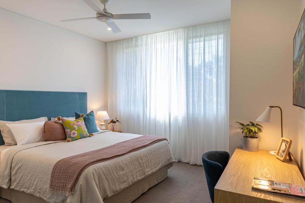 Postel nebo postele na pokoji v ubytování Escape Villas Port Douglas