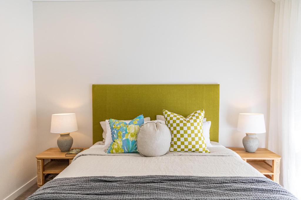 Postel nebo postele na pokoji v ubytování Escape Villas Port Douglas