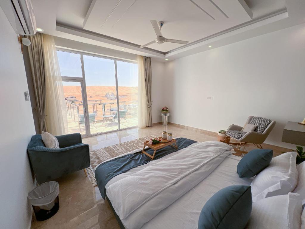 Postel nebo postele na pokoji v ubytování R61 Sunrise Chalet