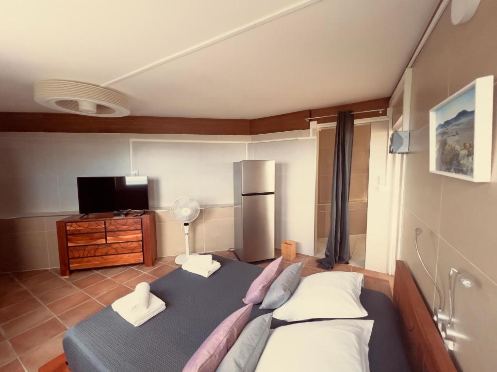 Postel nebo postele na pokoji v ubytování Vaste chambre vue mer montagne Ti Kaz Miyou 3