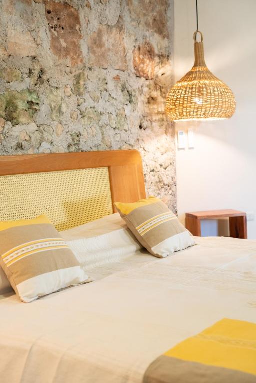 Postel nebo postele na pokoji v ubytování Casa Cactus Buenavista