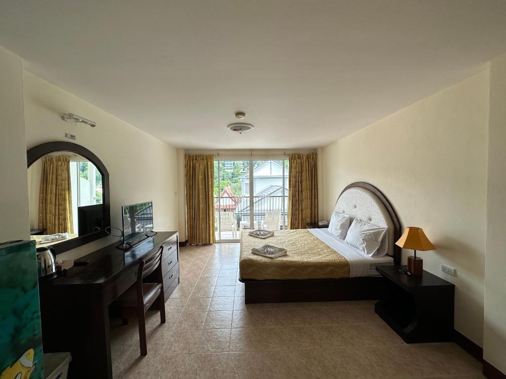 TV a/nebo společenská místnost v ubytování Kata Place Hotel