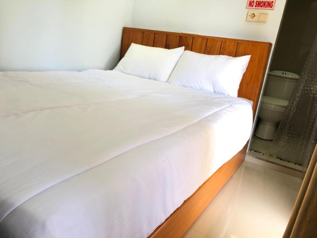 Postel nebo postele na pokoji v ubytování Sedana Yoga Resort