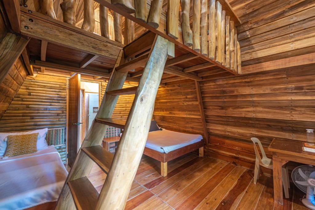 Postel nebo postele na pokoji v ubytování Camanolo Homestay