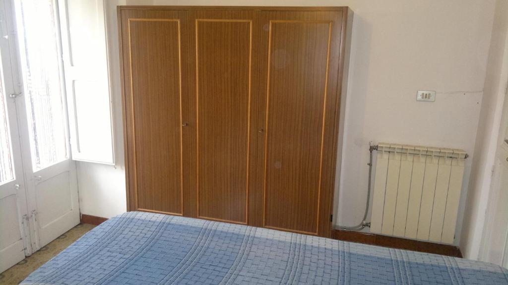 Łóżko lub łóżka w pokoju w obiekcie Casa Salvaggio