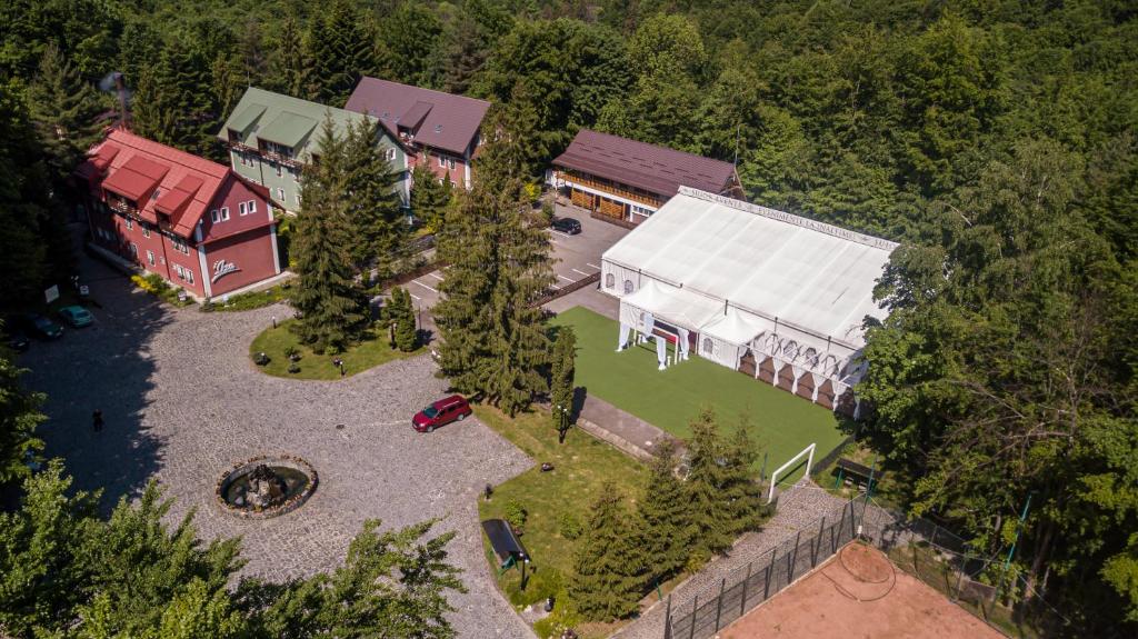 an aerial view of a building with a train station at Turist Suior Baza in Baia-Sprie