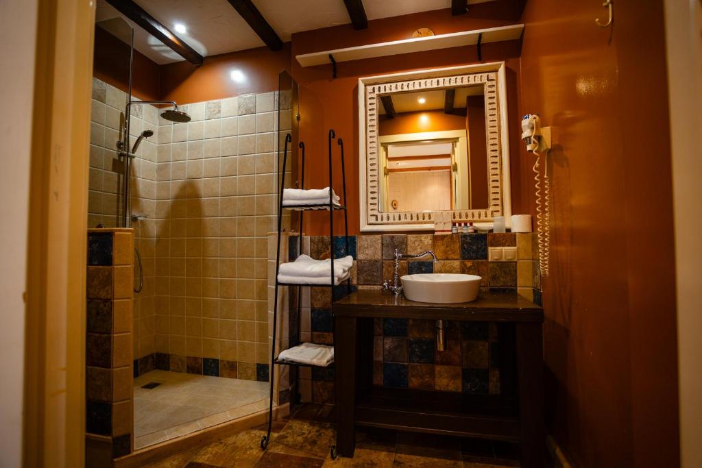 Koupelna v ubytování Piazza Boutique Hotel