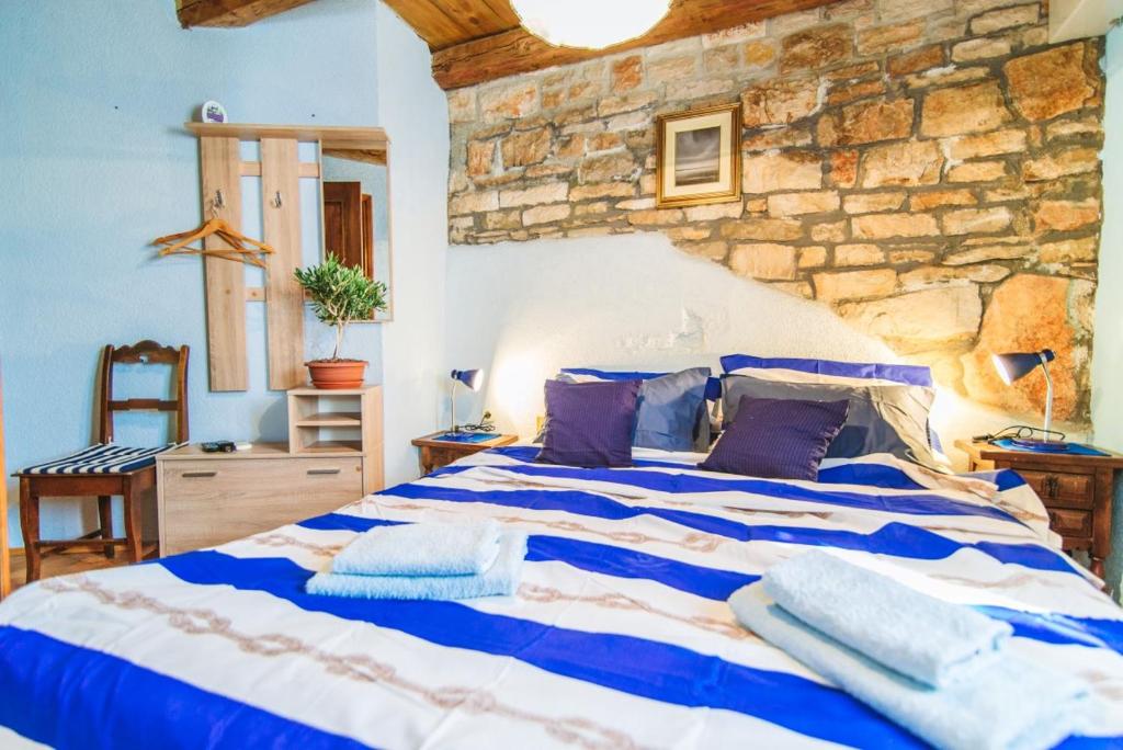 Postel nebo postele na pokoji v ubytování Rural Pension Istra Partner