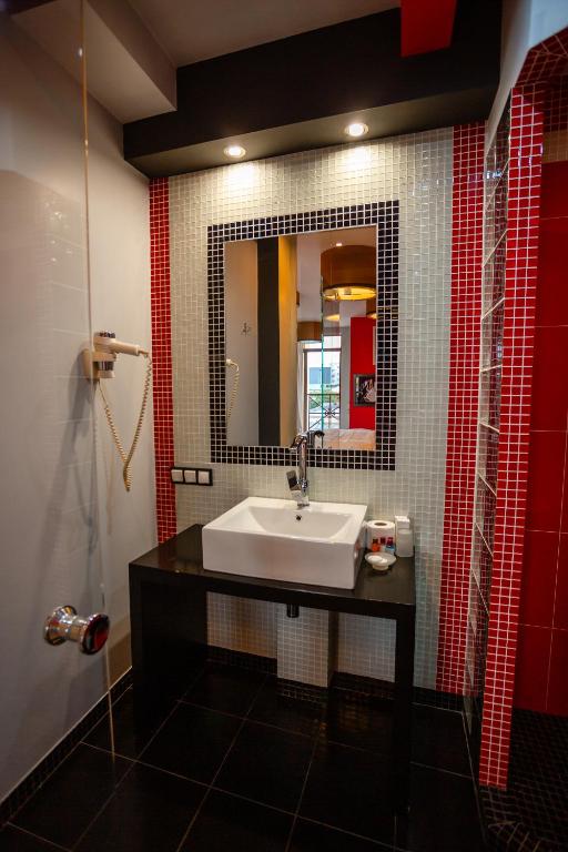 Koupelna v ubytování Piazza Boutique Hotel