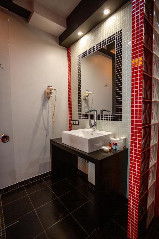 Koupelna v ubytování Piazza Boutique Hotel