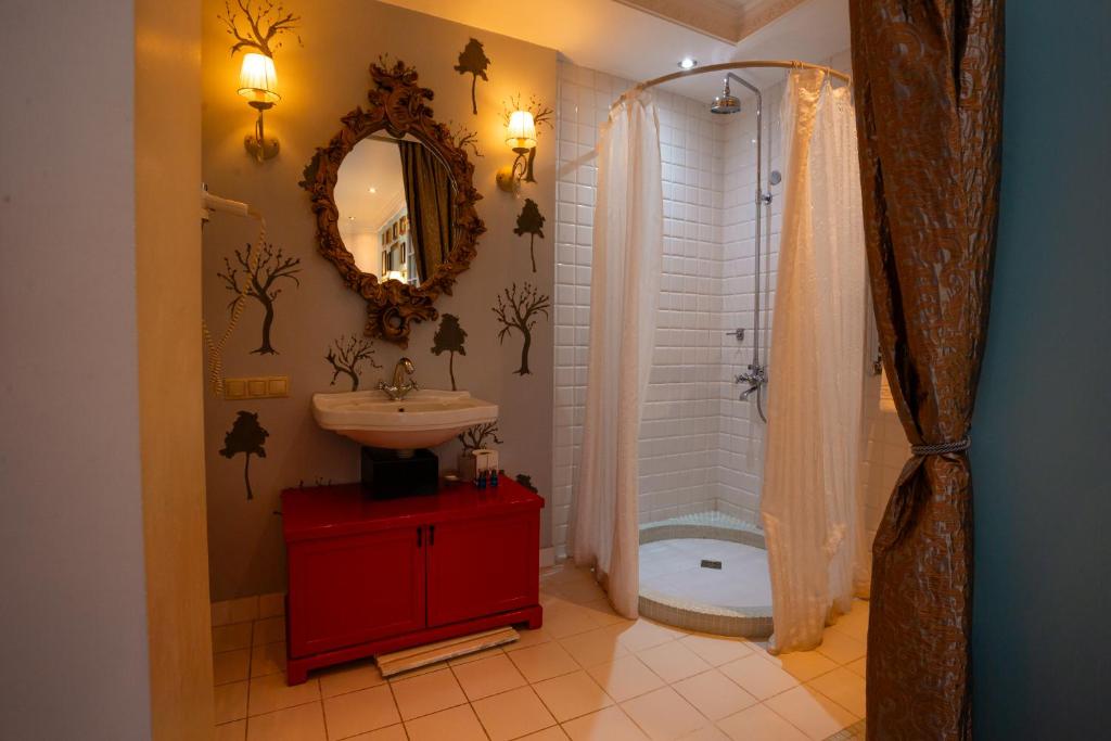 Koupelna v ubytování Piazza Boutique Hotel