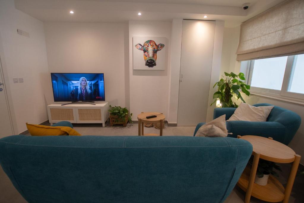 TV a/nebo společenská místnost v ubytování Gest