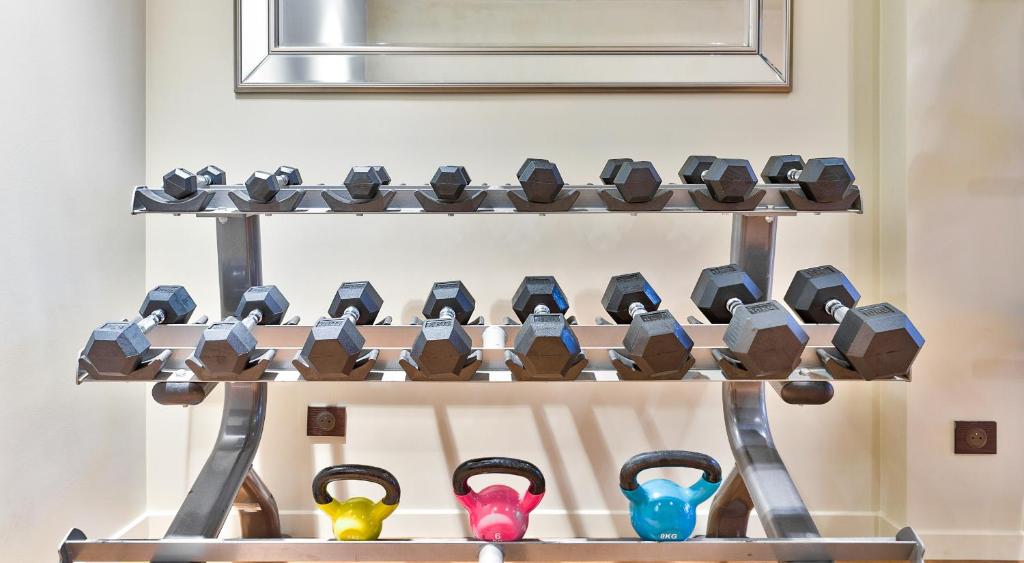 a display of shoes on a shelf in a store at 19 Atelier Montorgueil in Paris