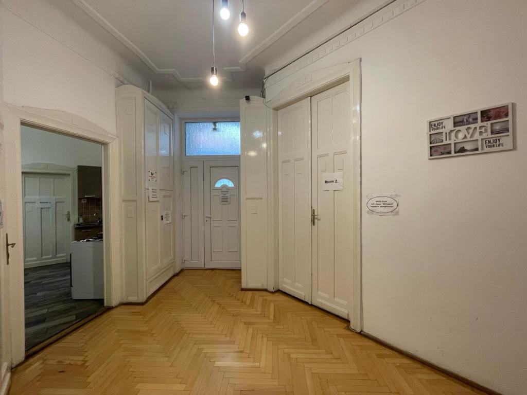 TV a/nebo společenská místnost v ubytování White Pearl Rooms near Gozsdu