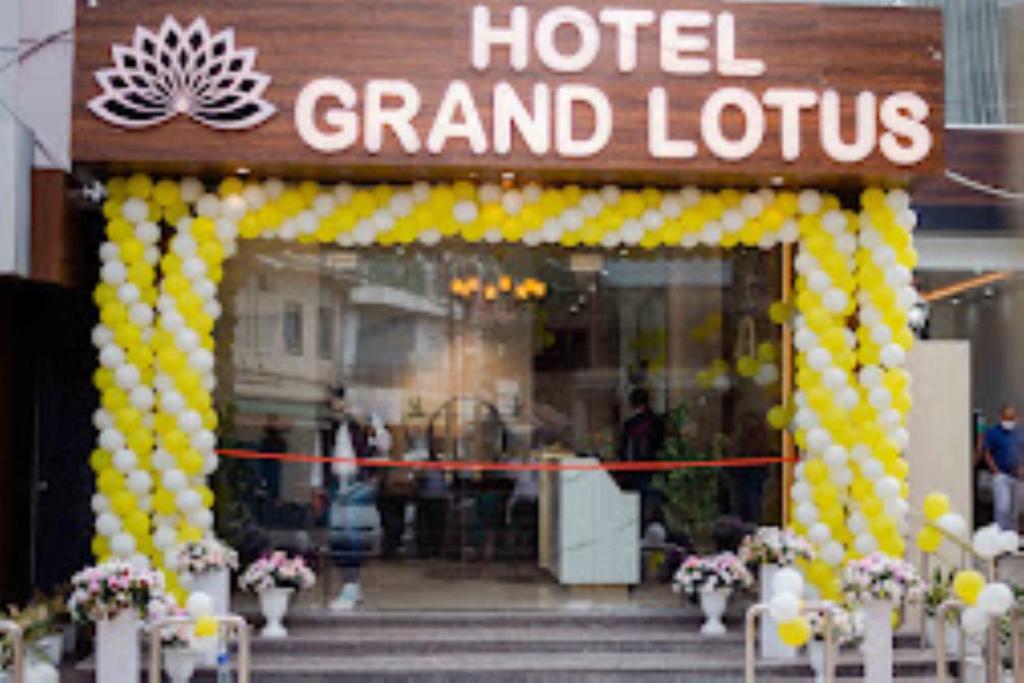 a hotel grand lotus entrance with yellow and white balloons at Hotel Grand Lotus Dimapur in Dimāpur