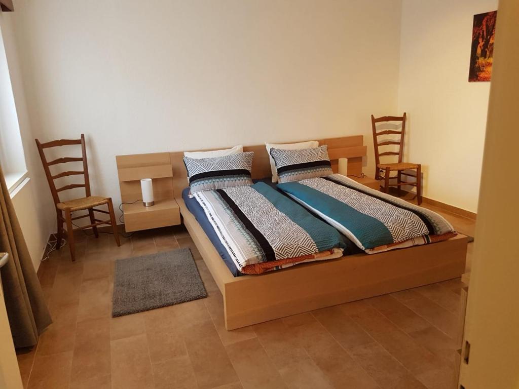 Postel nebo postele na pokoji v ubytování La casetta Brè
