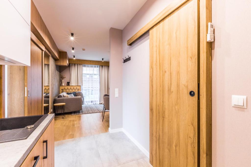 Posteľ alebo postele v izbe v ubytovaní Aparthotel Lucylla